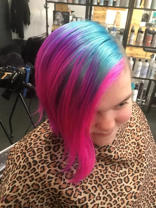 Hair Extensions photo, Denver Colorado. This beautiful young one wanted aqua and pink with a side sw(..)